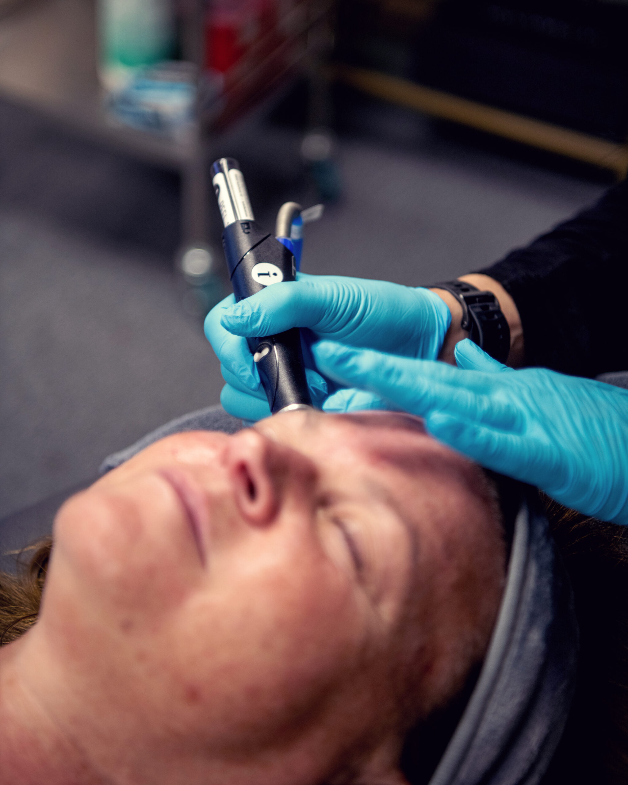 A client receiving a Hydrafacial at Lemondrop Aesthetics for glowing summer skin in Longview, WA.
